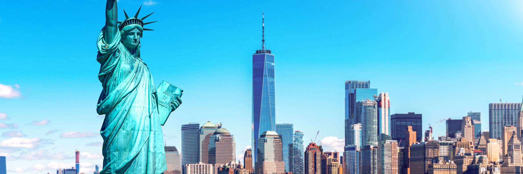 The Statue of Liberty with the One world Trade building center over hudson river and New York cityscape background, Landmarks of lower manhattan New York city. Architecture and building concept